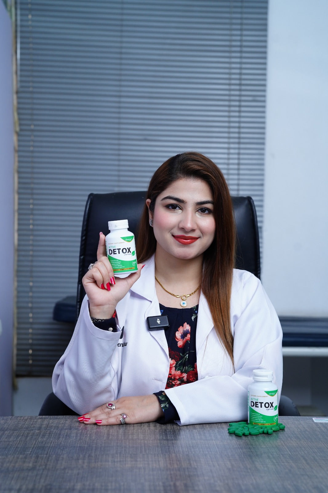 Active Detox bottle with healthcare professional, Clinicaly Pakistan